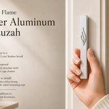 the Eternal Flame Silver Aluminum Mezuzah, showing the slim silver mezuzah case on a doorway with its raised ner tamid and stylized Shin, plus Made in Israel, waterproof construction, 5-inch kosher scroll fit, and mounting details