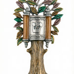 Large Etz Hayim Mezuzah with open Torah scroll, intricate details, and religious motifs on a white studio background with soft reflection.