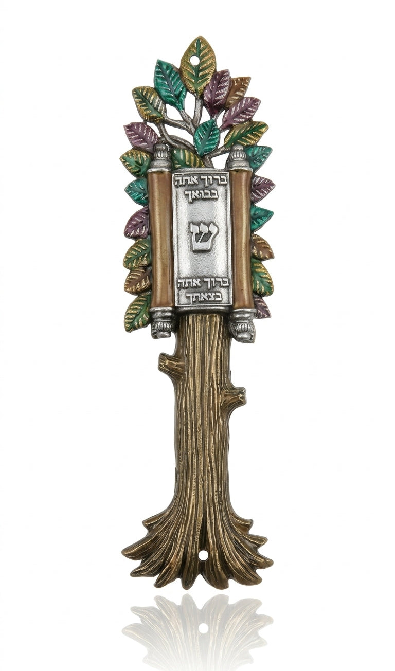Elegant Torah-shaped Mezuzah with open scroll and blessing inscription, displayed on a white studio background with soft reflection.