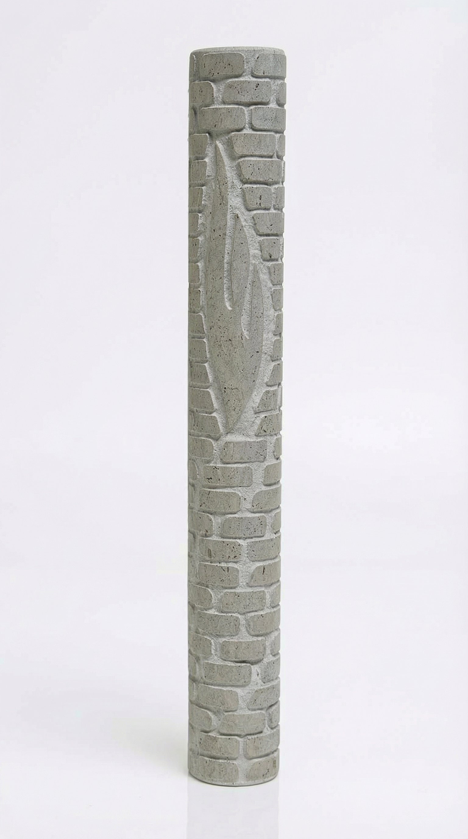 Handcrafted Jerusalem stone mezuzah with brick-style relief, carved Shin, and textured walls, embodying Jerusalem's heritage and history.