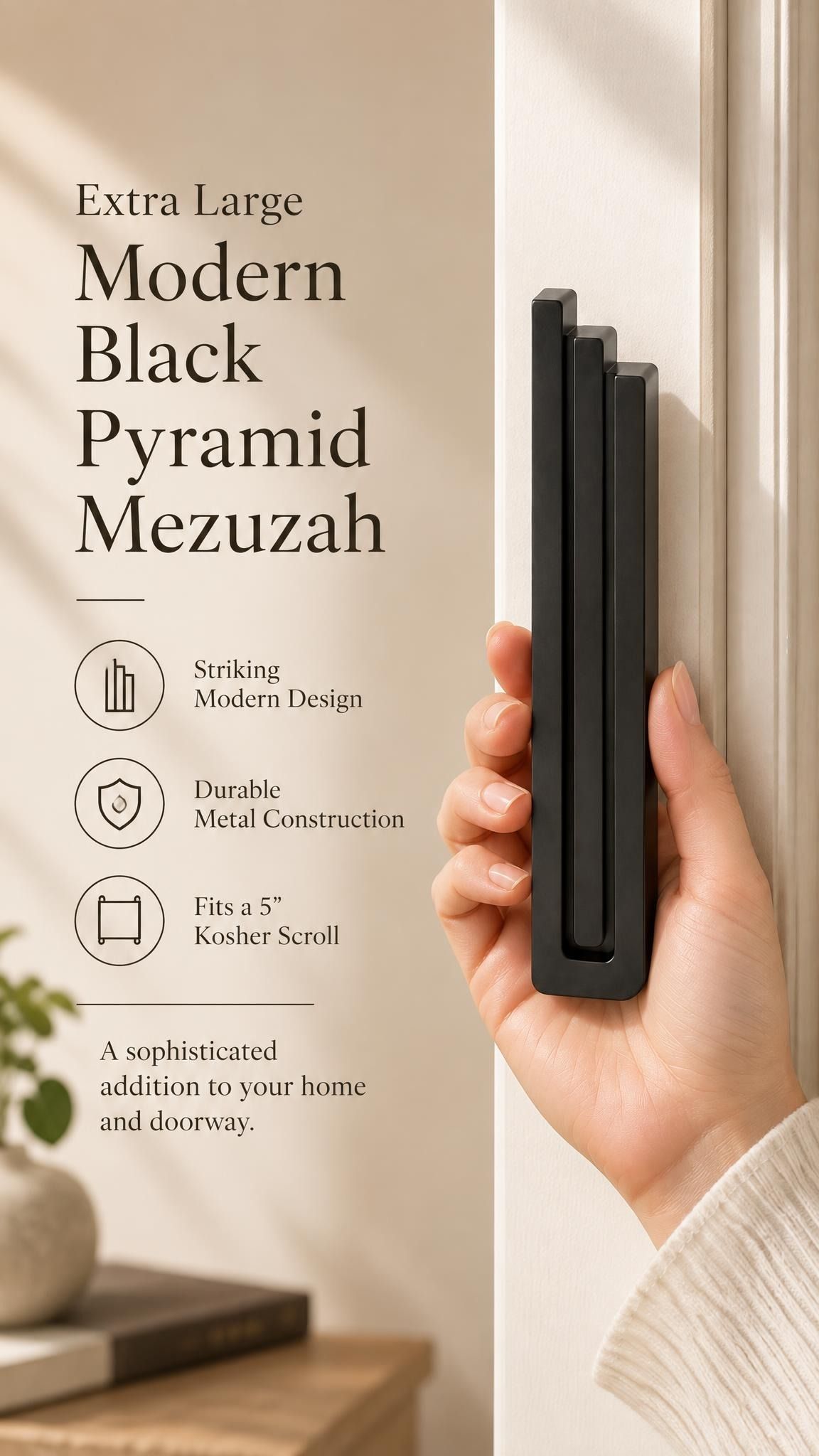 Hand holding the Extra Large Modern Black Pyramid Mezuzah upright, revealing its deep matte black aluminum mezuzah cover, slender three-bar Pyramid design and graduated top beside illustrated product features for minimalist Jewish home Judaica
