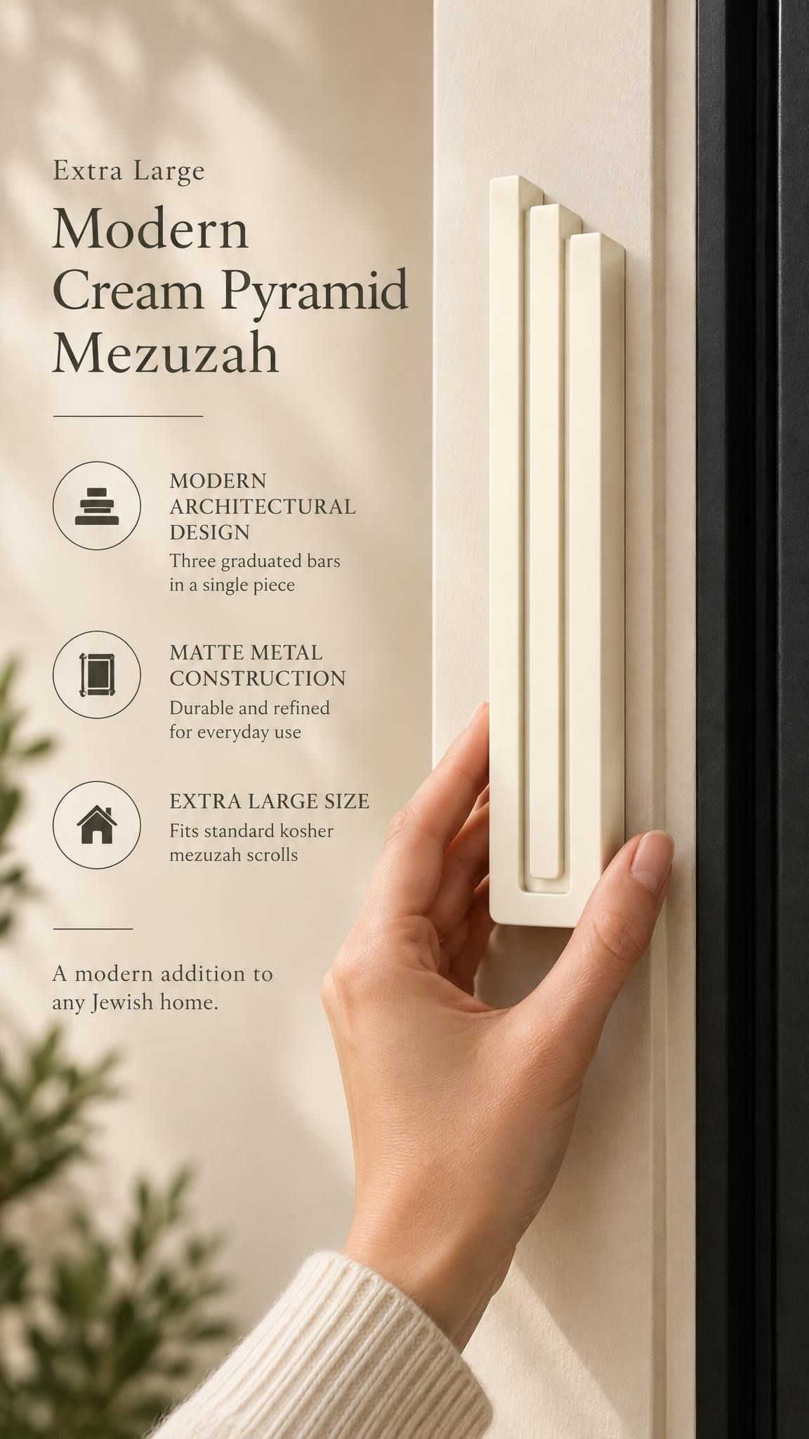Extra Large Modern Cream Pyramid Mezuzah held beside a doorpost, with the warm ivory cream aluminum mezuzah cover shown close enough to reveal its three stepped bars and rounded lower edge alongside product-name and design callouts for this architectural Judaica piece
