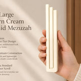 Extra Large Modern Cream Pyramid Mezuzah pictured in hand as a warm ivory cream aluminum mezuzah cover with three graduated bars and a architectural stepped design, alongside its name and illustrated product features in a wide social-sharing image