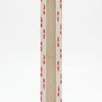 Back of an extra large sized Shaddai Ramparts Jerusalem stone mezuzah showing long recessed scroll chamber and included mounting tape