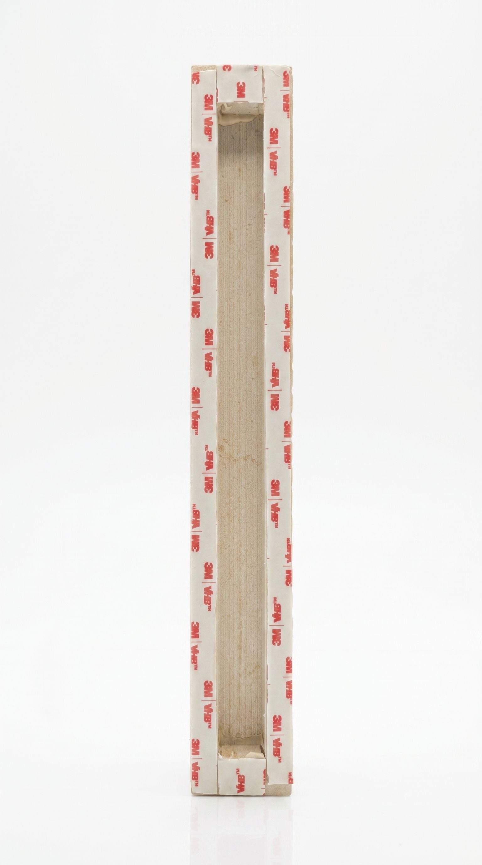 Back of an extra large sized Shaddai Ramparts Jerusalem stone mezuzah showing long recessed scroll chamber and included mounting tape
