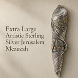 Premium image of the large sterling silver Jerusalem Mezuzah with city relief design on a stone background
