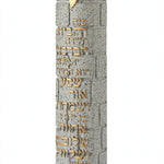 Angled view of the Extra Large Textured Birkat HaBayit Gray Concrete Mezuzah, a waterproof stone-block textured mezuzah case from Israel with a raised gold Shin and gold Hebrew home blessing, fitting a kosher scroll up to 8 inches
