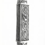 Handcrafted sterling silver mezuzah with intricate filigree and engraved Hebrew symbols, on a pure white background with soft reflection.