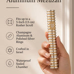 Grooved Cylinder champagne mezuzah specification image highlighting the 5.5-inch aluminum body, 5-inch kosher scroll fit, screw-cap closure, and Israeli origin