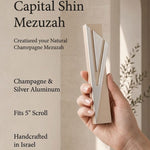 Capital Shin champagne mezuzah specification image highlighting the 5.5-inch body, 5-inch kosher scroll fit, Israeli origin, and bottom opening