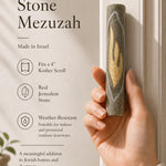 A woman holding the gray Jerusalem stone mezuzah at a realistic scale, showcasing its texture and Hebrew Shin, with warm natural lighting.
