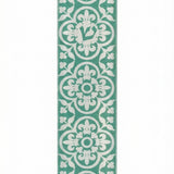 A detailed acrylic Fes Mezuzah with Hebrew inscriptions and decorative motifs, mounted vertically on a white background with a subtle reflection.