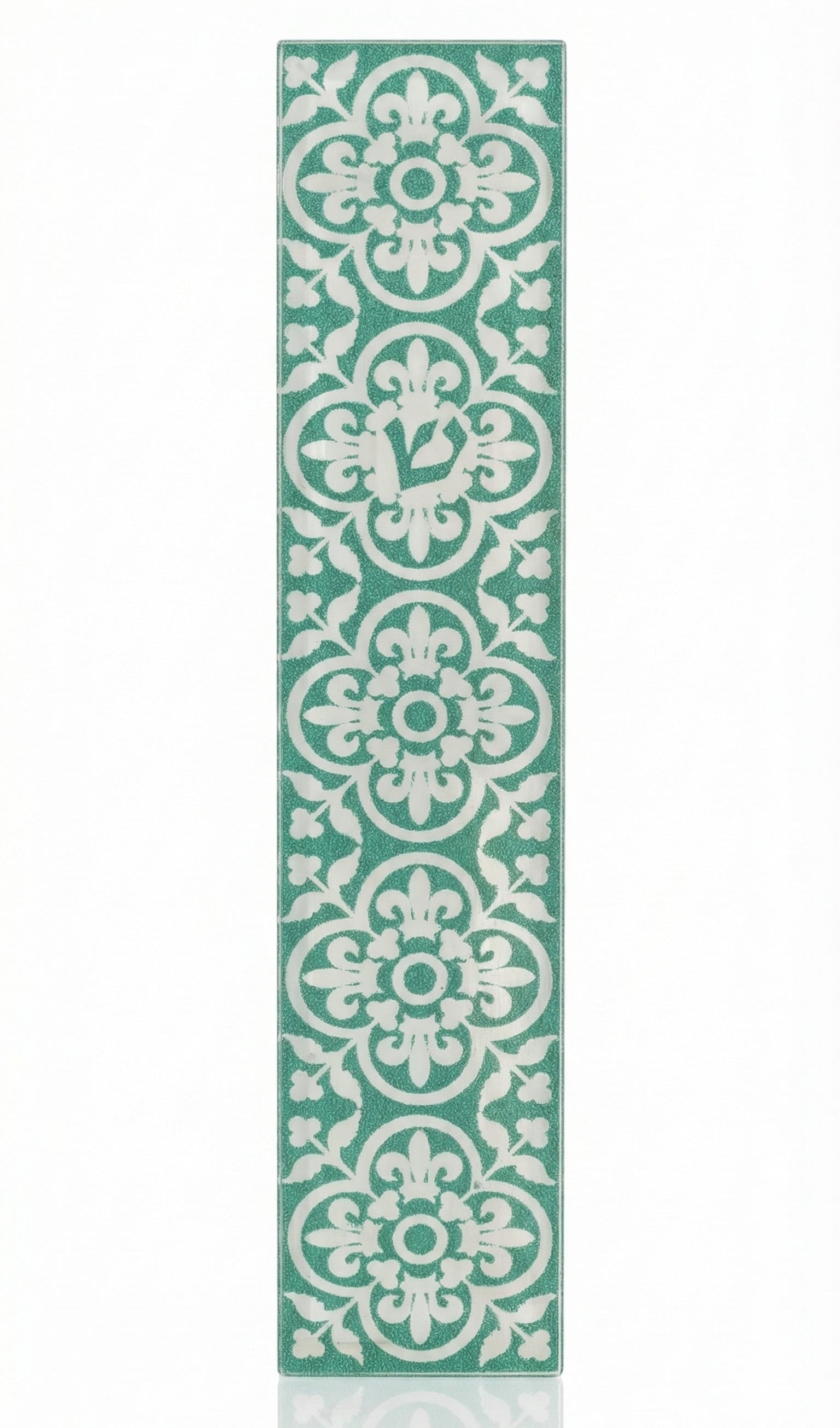 A detailed acrylic Fes Mezuzah with Hebrew inscriptions and decorative motifs, mounted vertically on a white background with a subtle reflection.