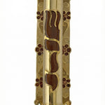 Detailed Fields of Gold Mezuzah made of pewter with hand-painted enamel, measuring 5.25 inches tall, with Hebrew inscriptions and decorative motifs.
