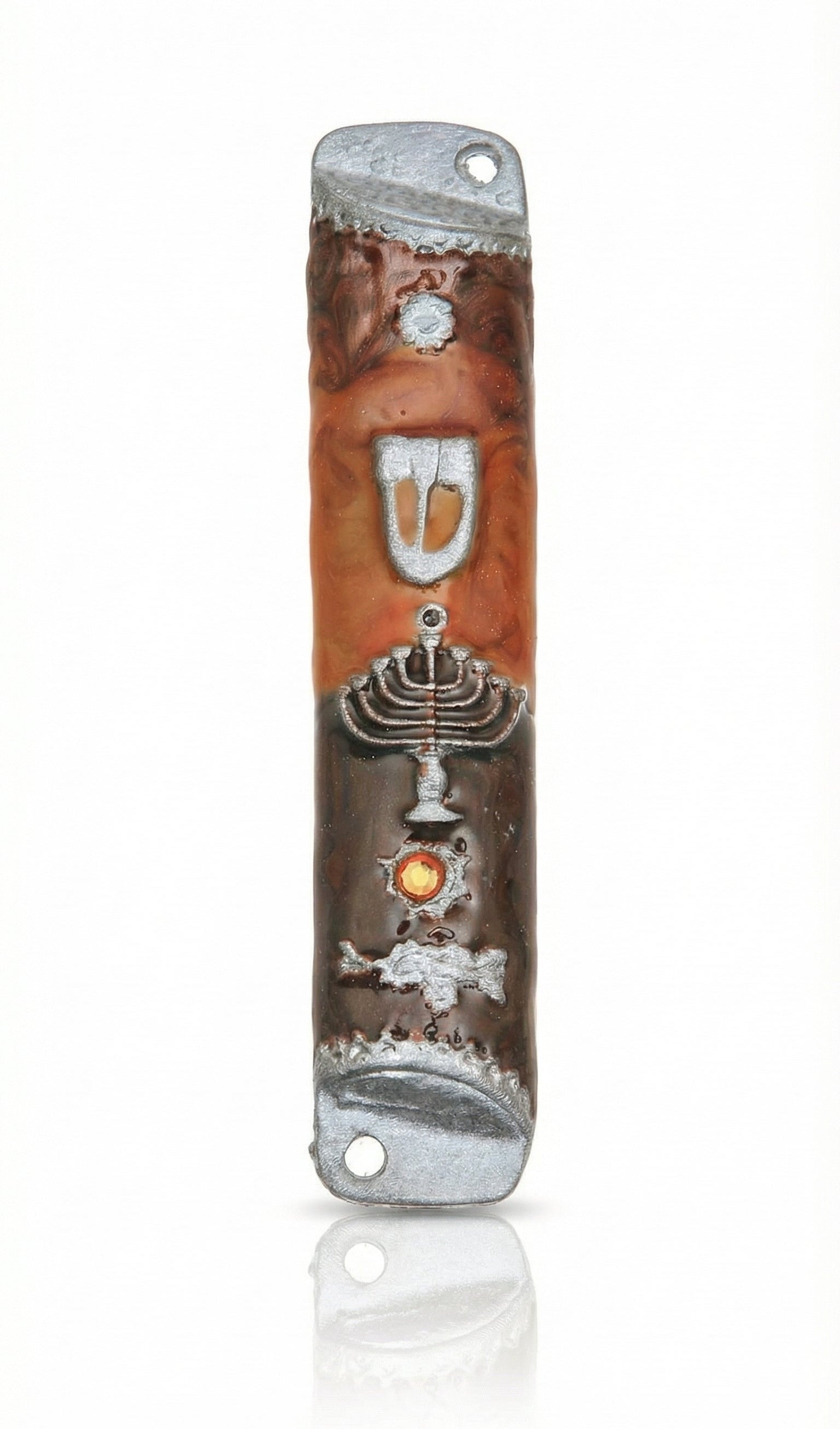 Passionate pewter mezuzah with enamel featuring a menorah and Hebrew letter Shin, displayed on a white studio background with soft reflection.