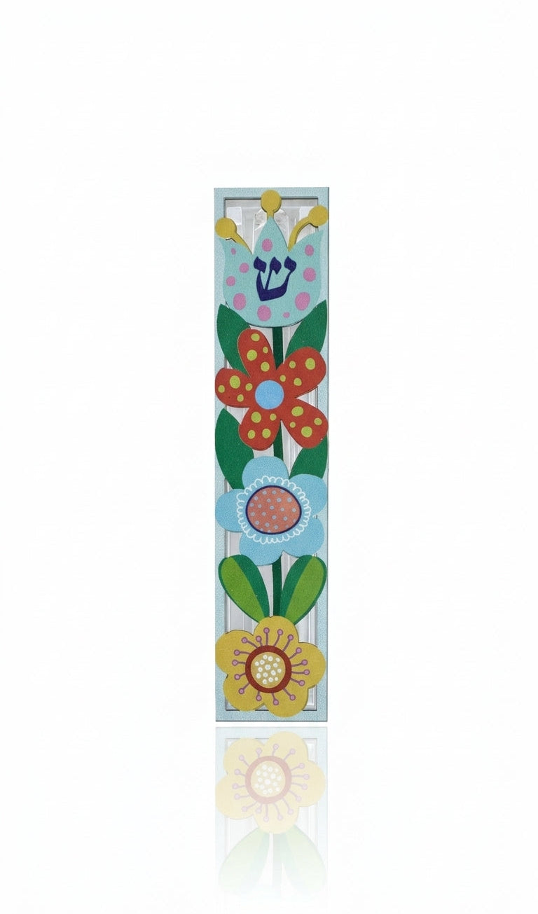 Elevated image of an aluminum Flowers Mezuzah with Hebrew engravings, set against a pure white background with a soft reflection.