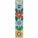 Elevated image of an aluminum Flowers Mezuzah with Hebrew engravings, set against a pure white background with a soft reflection.