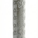 Handcrafted Jerusalem stone mezuzah with Hebrew inscriptions, detailed surface texture, and decorative motifs on a white background with soft reflection.