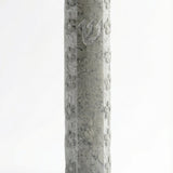 Handcrafted Jerusalem stone mezuzah with floral motifs, Hebrew script, and decorative details, on a white studio background with subtle reflection.