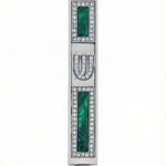 Petite Forest Treasure Mezuzah with green accents on a metal base, designed for doorposts, featuring Hebrew inscriptions and detailed motifs.