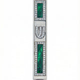 Petite Forest Treasure Mezuzah with green accents on a metal base, designed for doorposts, featuring Hebrew inscriptions and detailed motifs.
