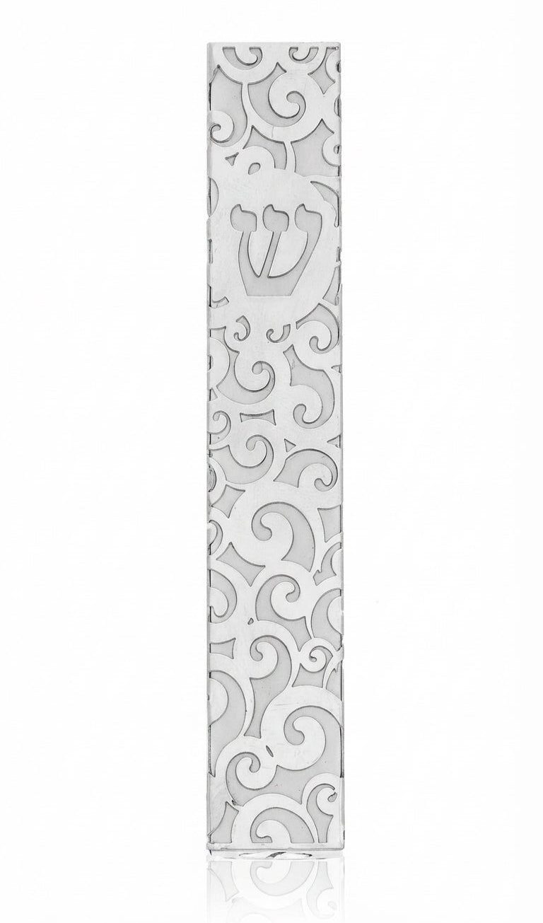 High-resolution image of a metal Gale Mezuzah with elegant swirl design, mounted outdoors with double-sided tape, showcasing fine details and craftsmanship.
