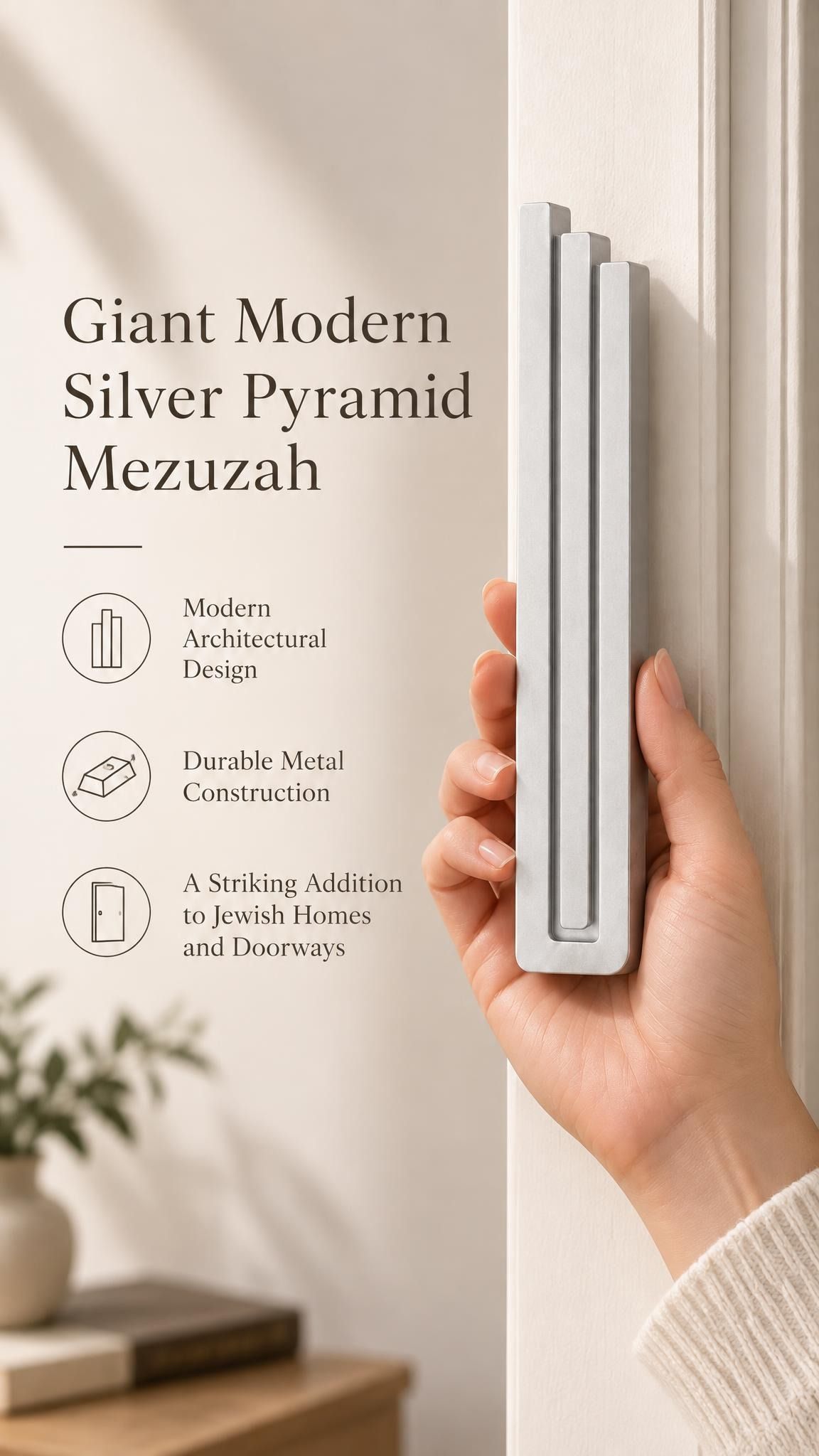 A hand presents the Giant Modern Silver Pyramid Mezuzah with its softly brushed silver aluminum mezuzah cover facing forward, highlighting the clean graduated bars and geometric vertical profile beside design illustrations for a architectural Jewish doorway accent