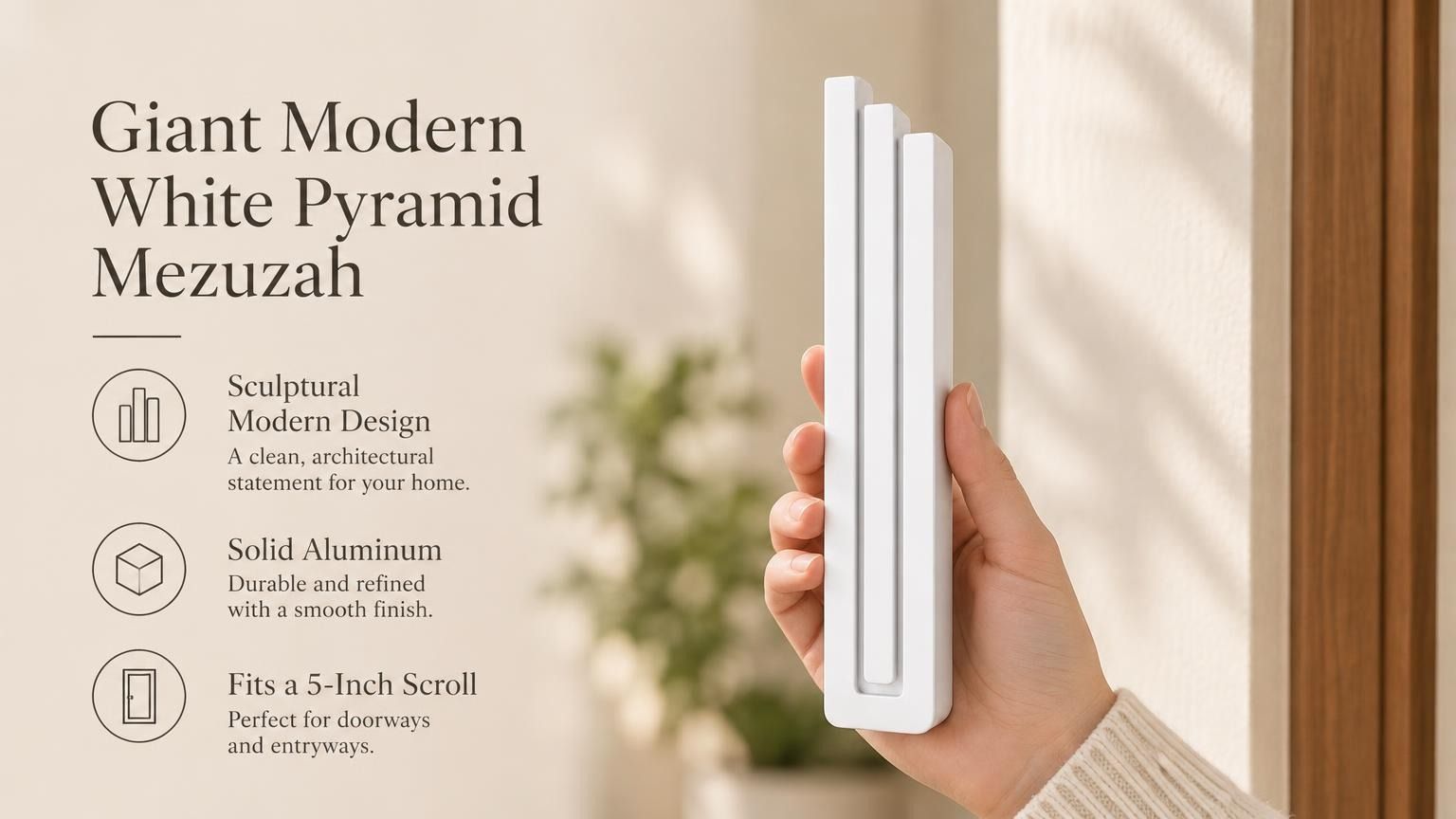 Giant Modern White Pyramid Mezuzah pictured in hand as a smooth matte white aluminum mezuzah cover with three graduated bars and a architectural stepped design, alongside its name and illustrated product features in a wide social-sharing image
