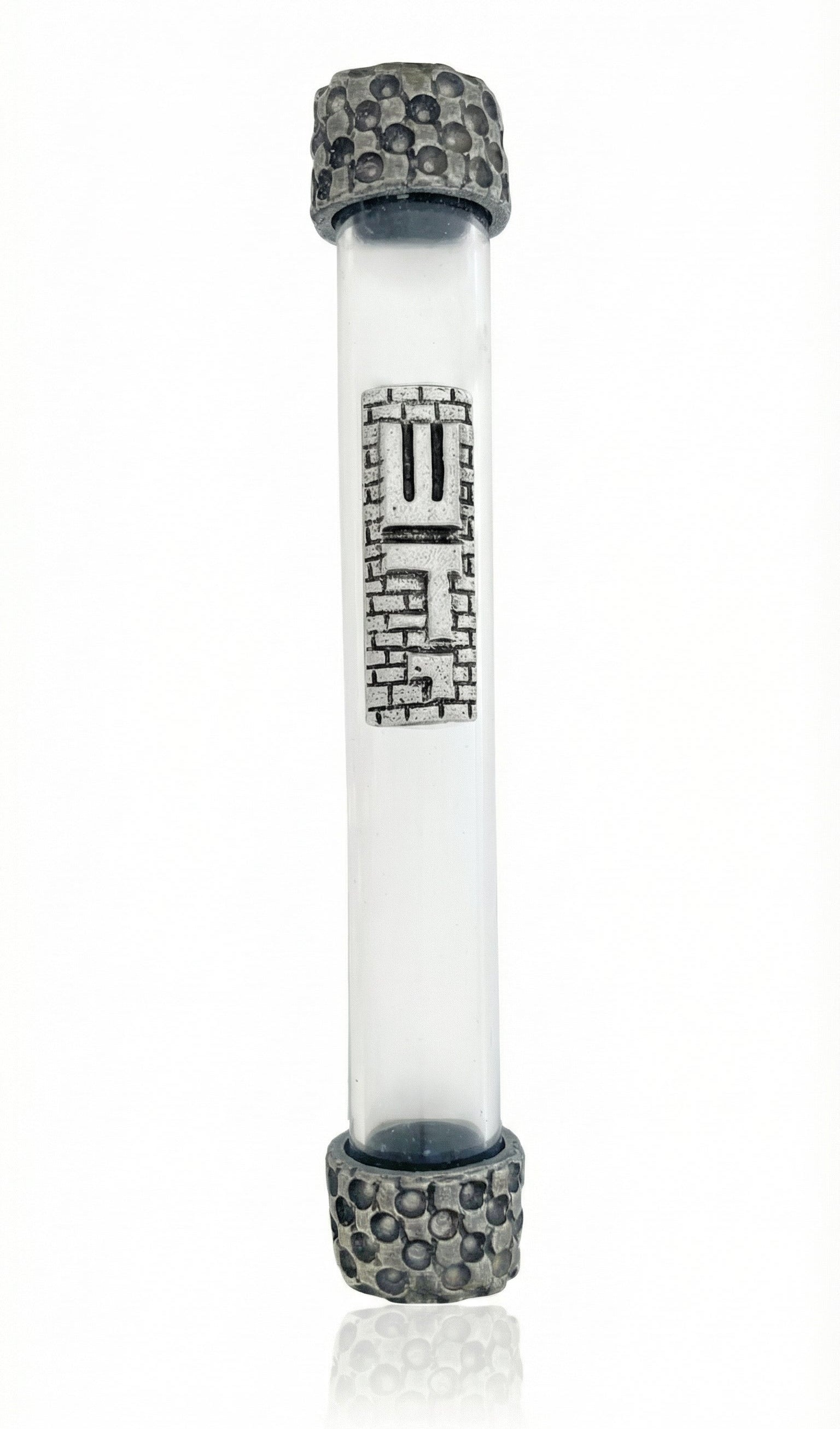 Elegant glass and pewter mezuzah in a studio setting with bright white background, detailed metal finish, engraved Hebrew letters, and soft reflection.