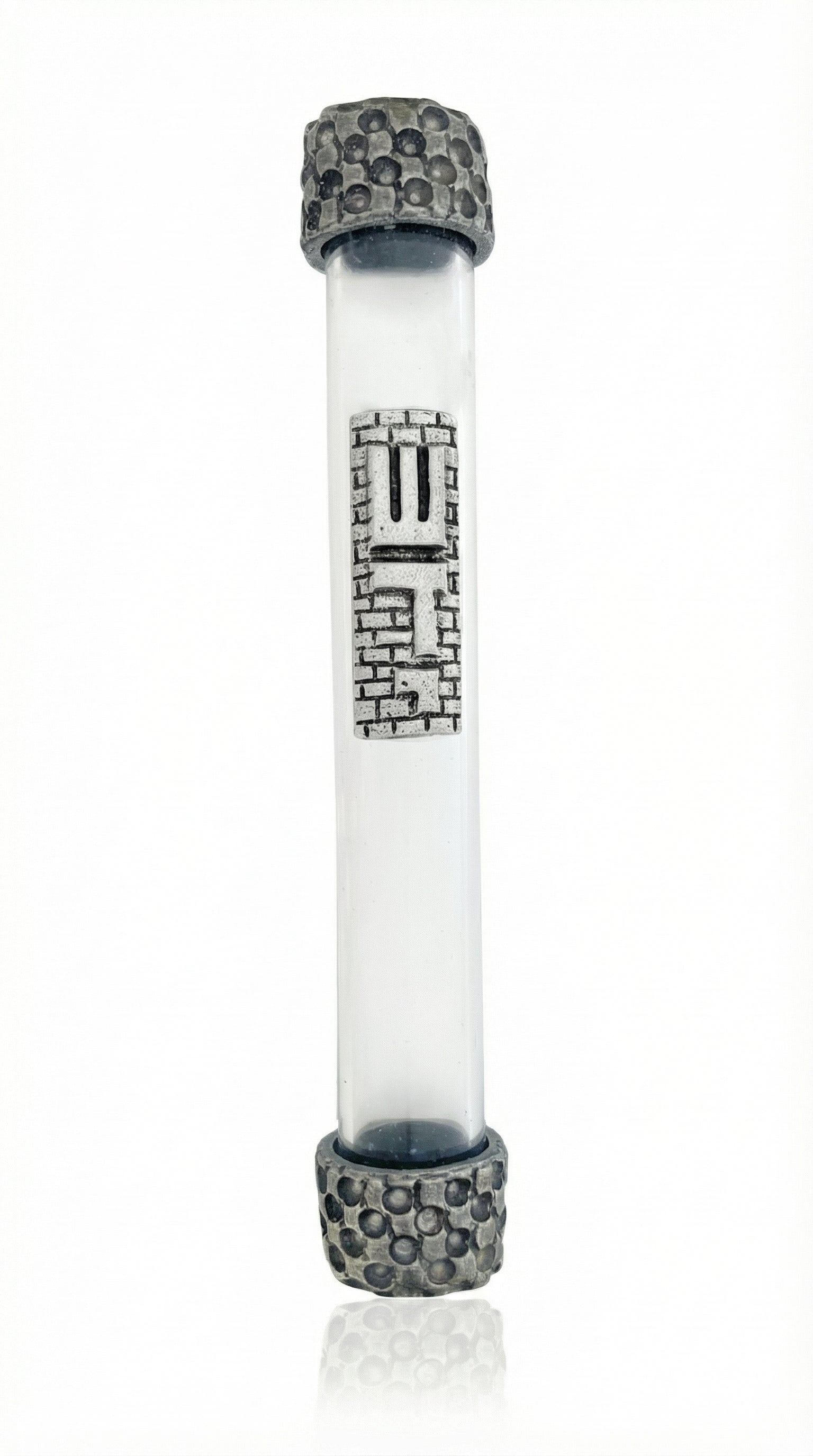 Elegant glass and pewter mezuzah in a studio setting with bright white background, detailed metal finish, engraved Hebrew letters, and soft reflection.