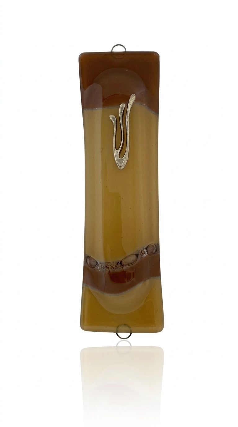 Elegant brown glass Mezuzah measuring 4.5 inches tall, with detailed engraved Hebrew letters and decorative motifs, on a white background with subtle reflection.