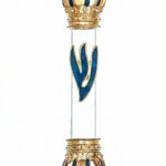 Hand-painted glass and metal Crown Mezuzah with blue enamel and tiny decorative stones, displayed vertically with bright white background.