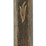 Elegant gold and black fusion mezuzah with intricate engraved Hebrew lettering and decorative motifs, displayed on a white studio background with subtle reflection.