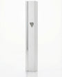 Gold mezuzah with intricate carvings and Hebrew inscriptions against a bright white background with soft reflection
