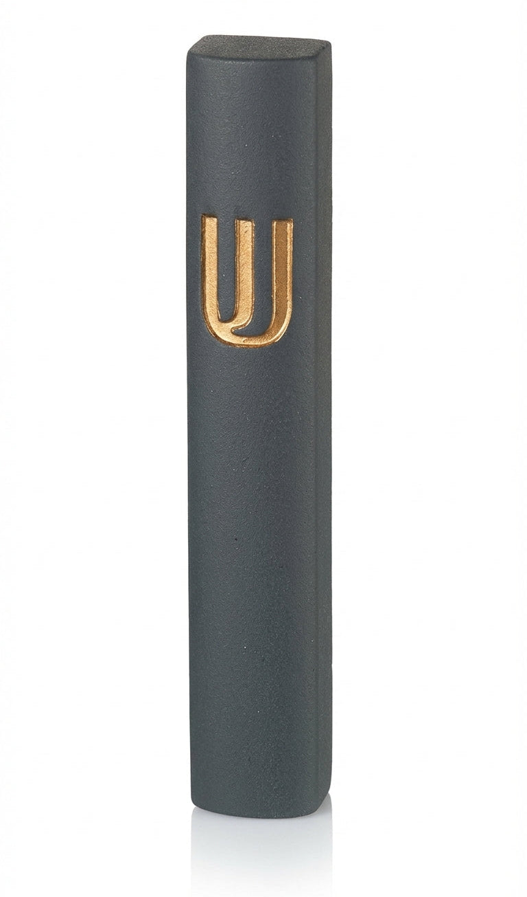 Gold Shin Mezuzah made in Israel from cement, 6 inches tall, adorned with detailed Hebrew inscriptions and decorative motifs, mounted on a white background.