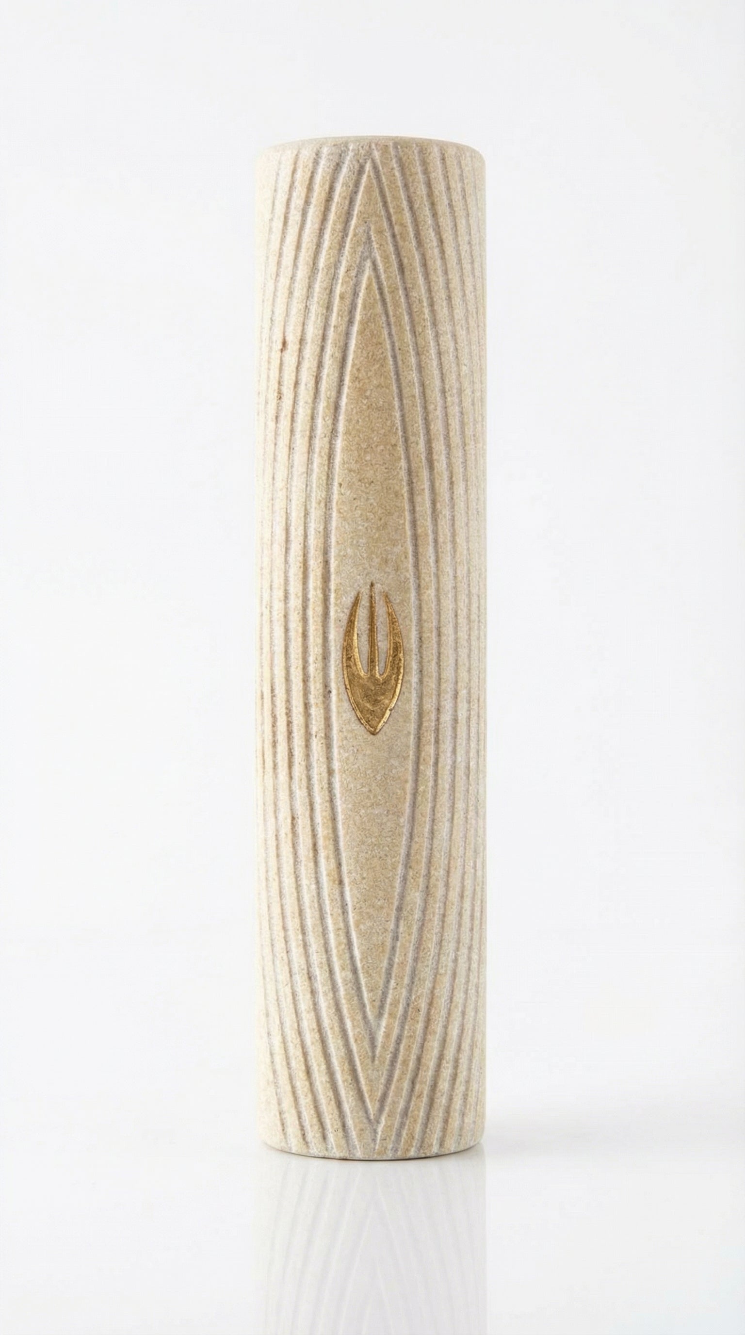 Jewish mezuzah crafted from natural Jerusalem stone with golden accents, detailed carvings, and textured surface, mounted on a neutral white background.