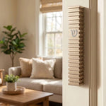 golden Steps Mezuzah mounted on a doorpost, demonstrating its placement in a typical home doorway