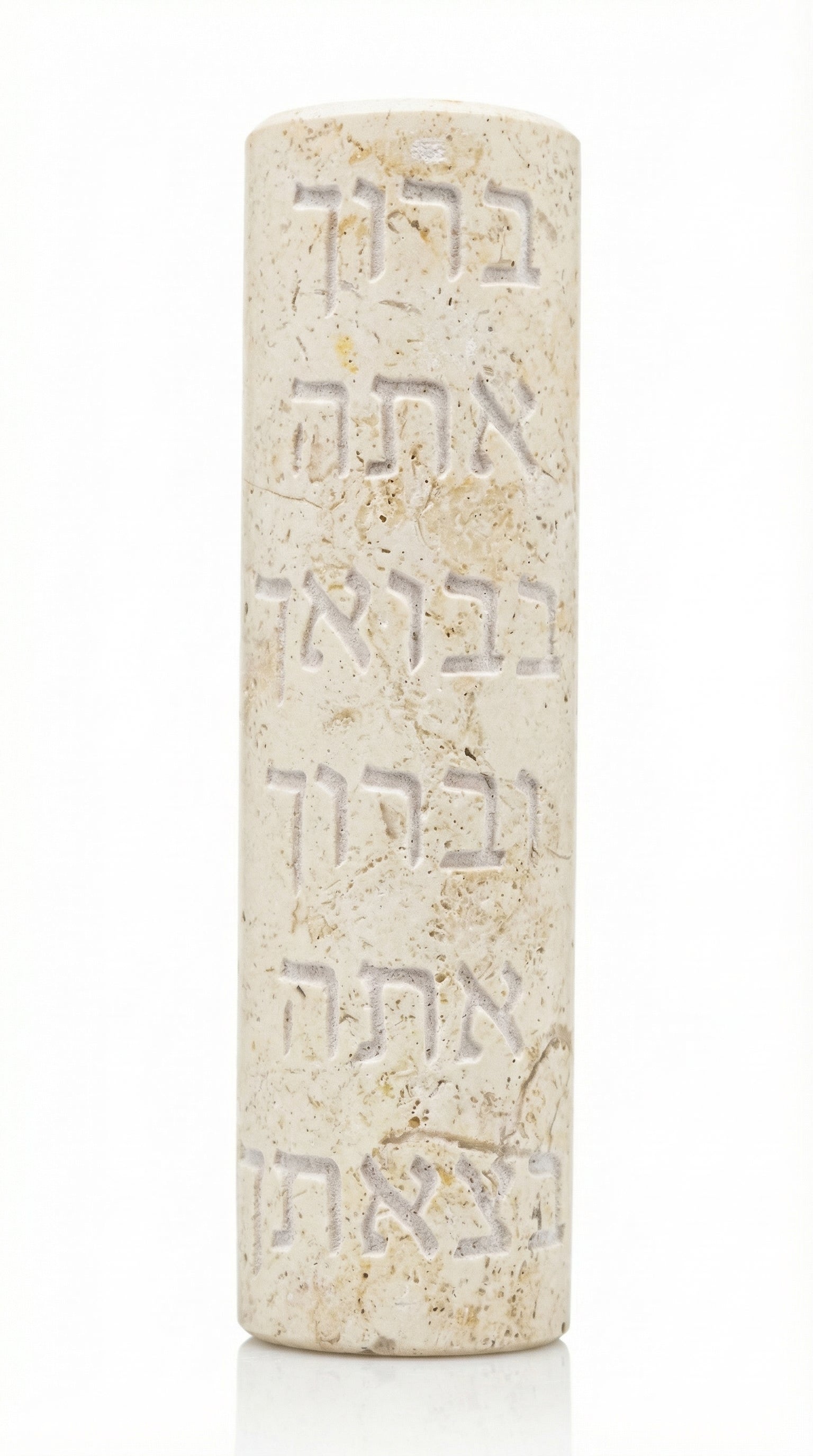 Elegant Jerusalem stone mezuzah with Hebrew blessing, handcrafted in Israel, featuring intricate surface details and natural color variations.