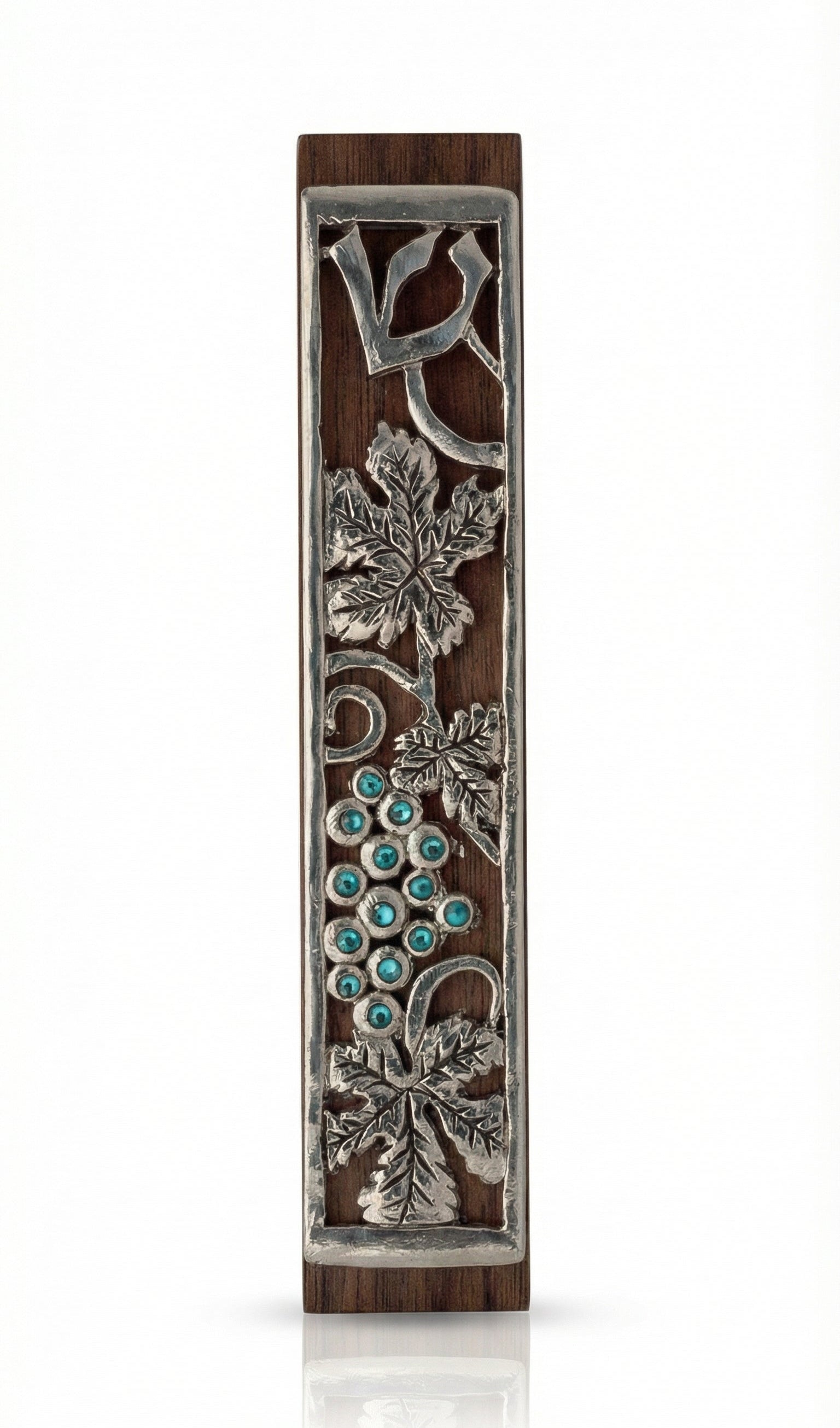 Mahogany mezuzah with curling pewter vine and turquoise stones, depicting one of the seven species of the holy land, detailed and crafted with fine finishing.