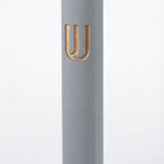 Large gray and gold Shin Mezuzah made of cement with Hebrew engraved details, designed for home doorways, 7 inches tall with strong mounting tape.