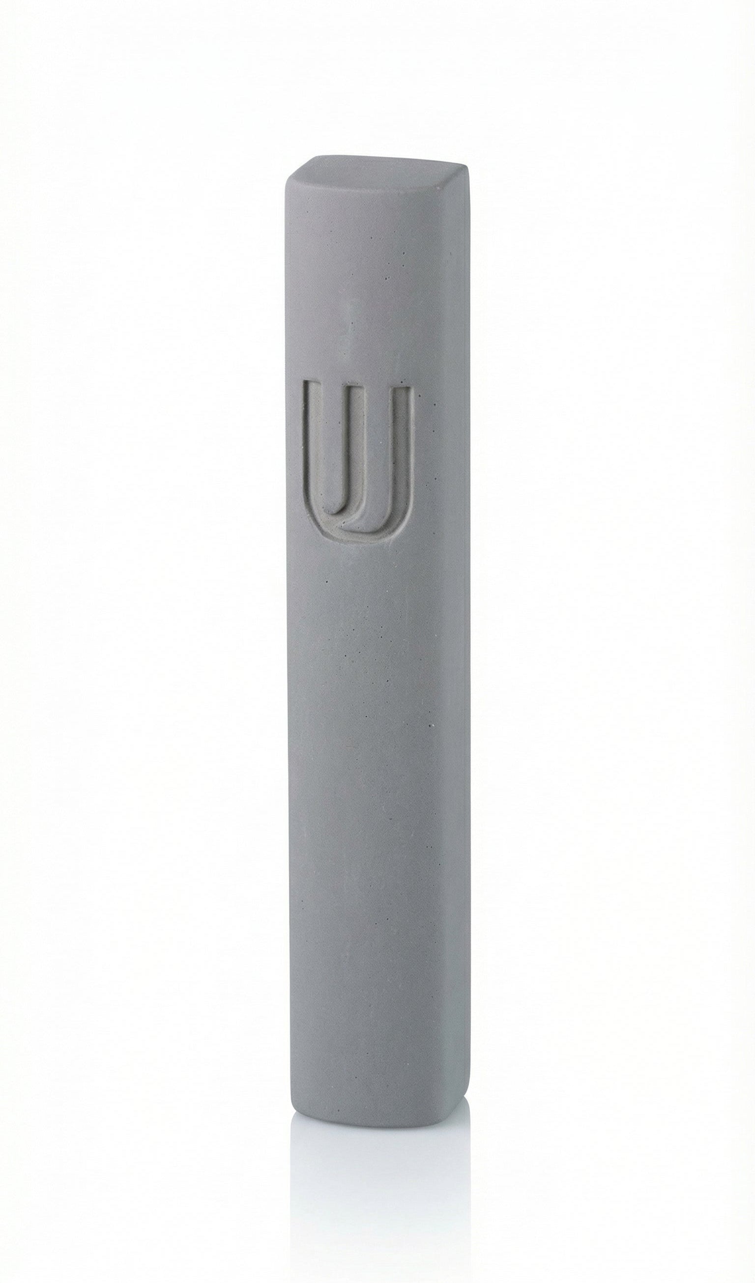 Gray Shin Mezuzah made of cement, 6 inches tall, affixed with strong tape, for doorways, with detailed Hebrew lettering and decorative motifs.