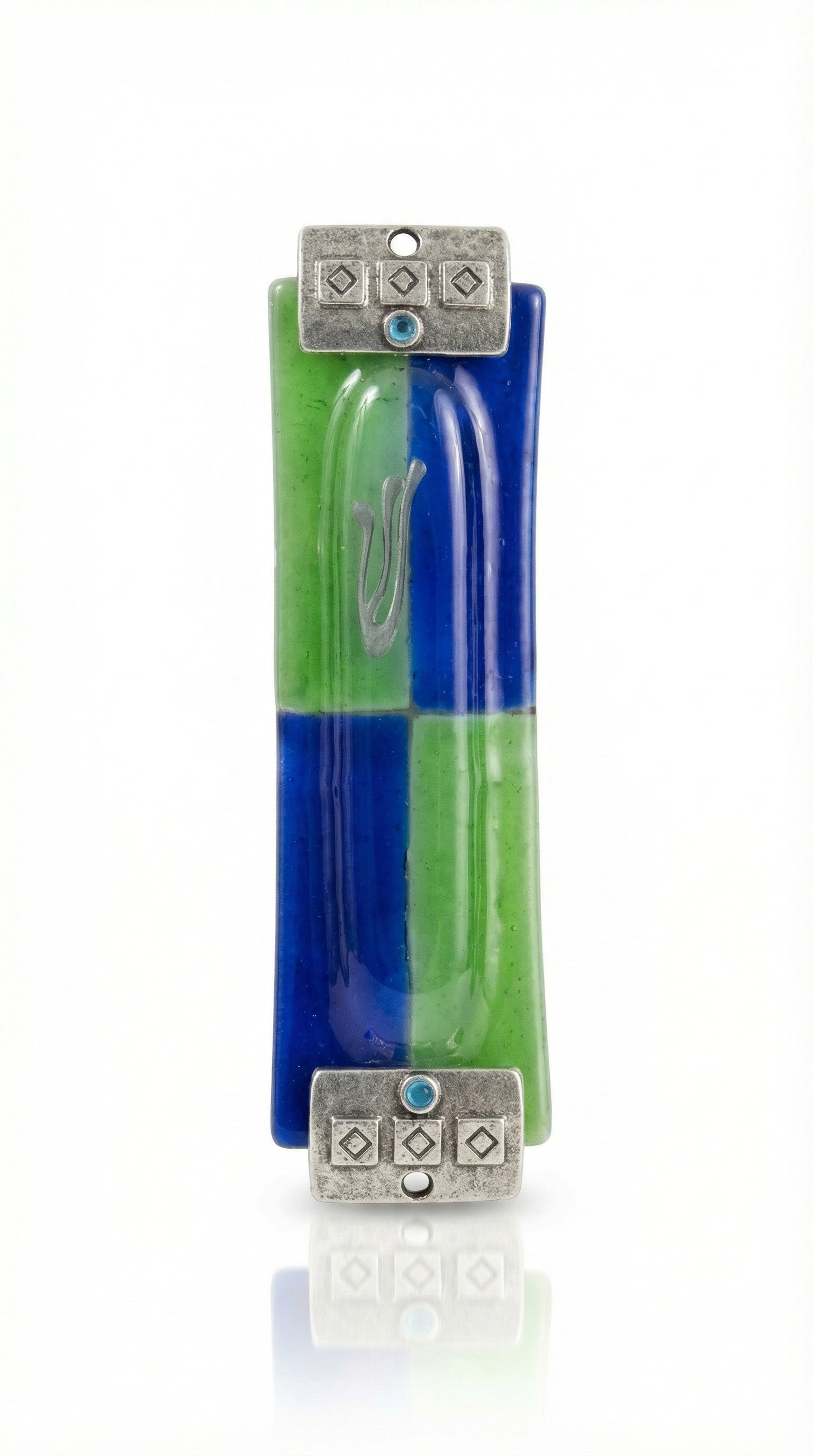 Fused glass Mezuzah in green and blue with silver textured accents, displayed on a white studio background with soft reflection.