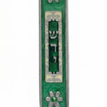 Hand-painted pewter Green Space Mezuzah, 5-inch tall with Hebrew symbols and decorative motifs, mounted with strong adhesive tape on a white background.