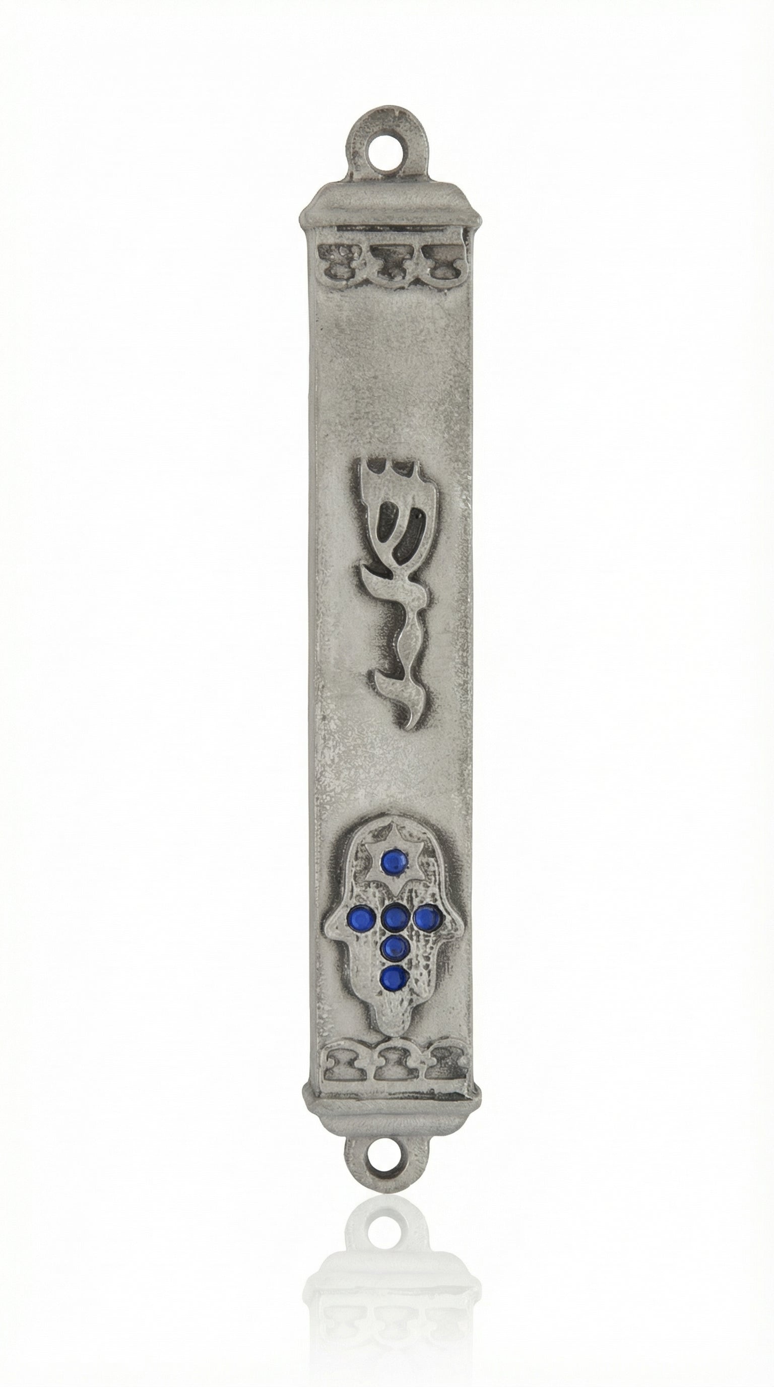 Bright blue accent stones adorn a Hamsa shape pewter Mezuzah, set on a clean white background with subtle reflection, highlighting intricate design details.
