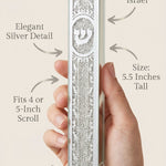 Person holding the Silver Script Glass Mezuzah, emphasizing its design, materials, and mounting details with a minimalist layout.