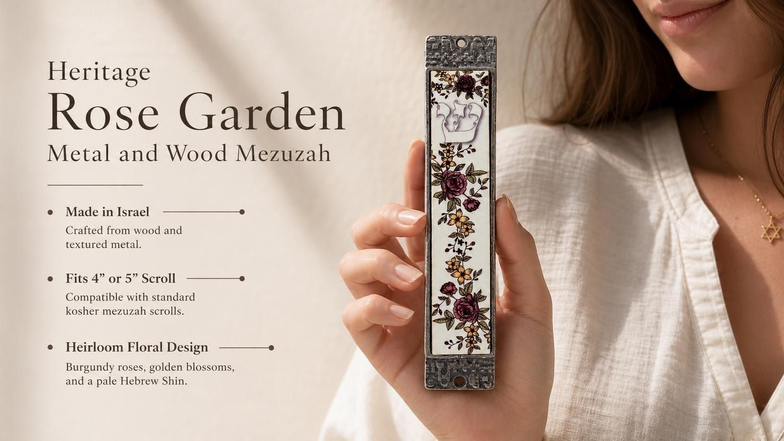 Person holding the Heritage Rose Garden Mezuzah made from wood and metal, highlighting floral design and Hebrew letter