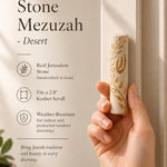 Person holding authentic Jerusalem stone mezuzah with gold olive branch in a natural pose for premium product presentation