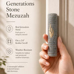 Person naturally holding the exact Jerusalem stone Mezuzah, displaying its shape, texture, and natural color variations, suitable for premium presentation.