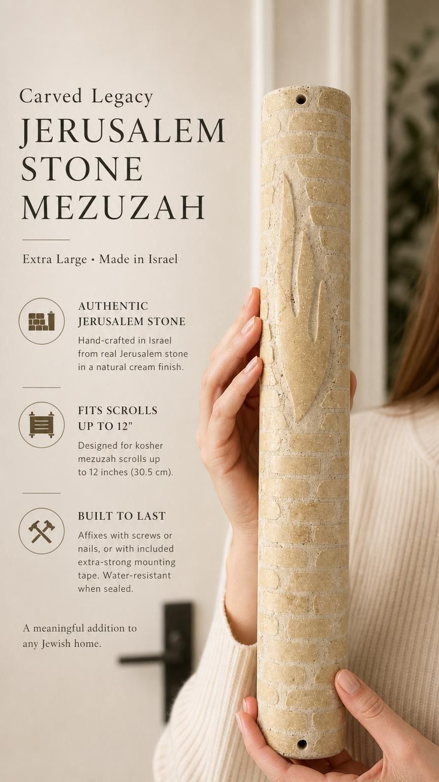 Person holding the Jerusalem Stone Mezuzah showing its carved Hebrew letter and textured surface in a premium editorial style.