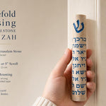 Person holding the Jerusalem stone mezuzah with Priestly Blessing in blue Hebrew lettering, natural soft light, editorial style.